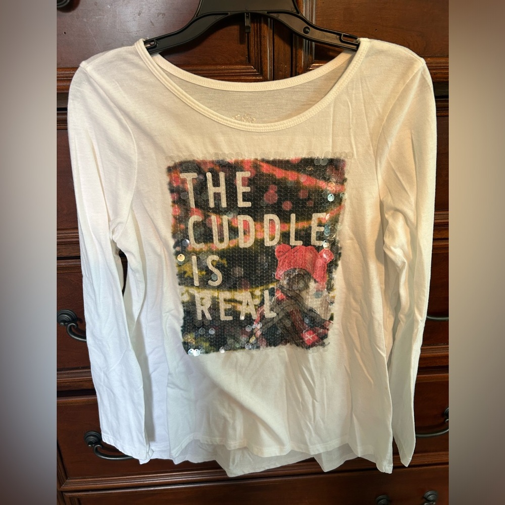 Long sleeve, white  justice shirt with “beads” on the front - size 12